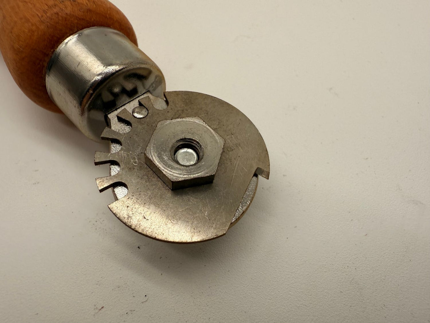 Adjustable Ply Knife.