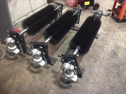 Conveyor belt cleaning system for reducing carry back and dust